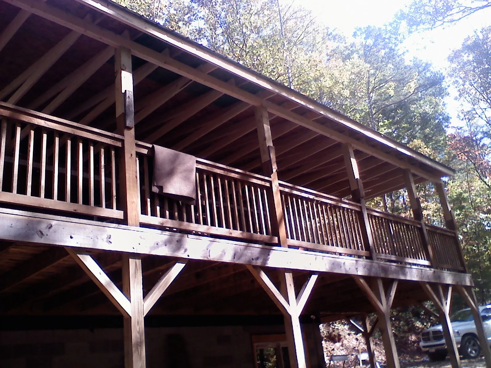 Timber framing under a new elevated porch and deck — Roof Leak Repair in Adolphus by Roofing Brothers